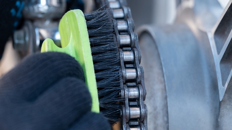 Scrubbing a motorcycle chain