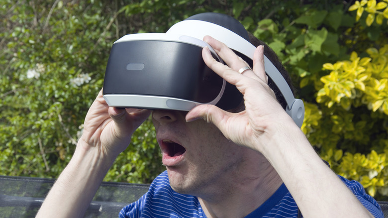 person wearing psvr headset