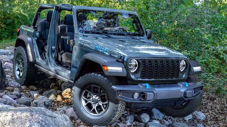 Jeep Wrangler riding over rocky path