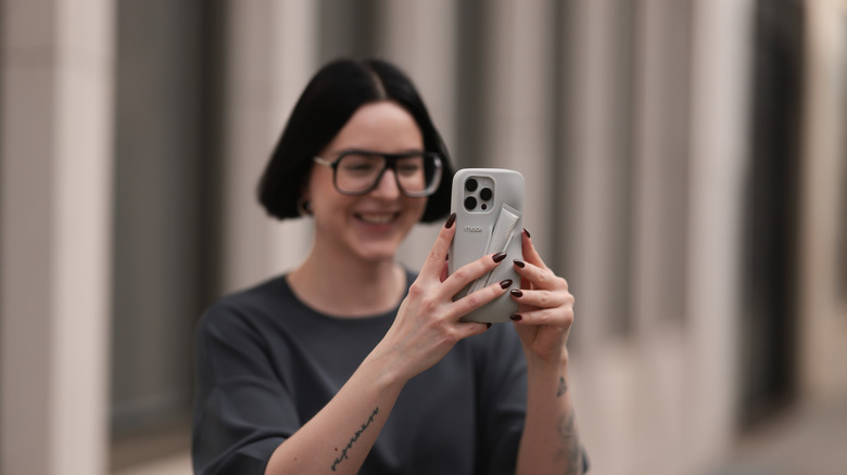 woman using iPhone