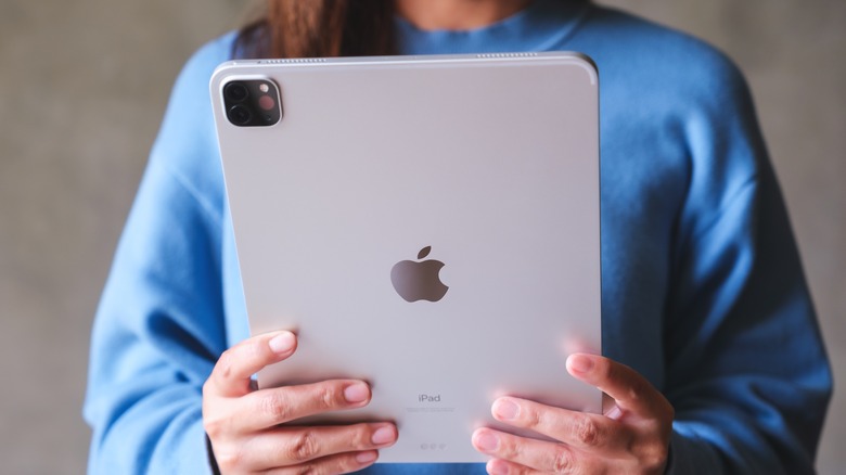 Person holding iPad