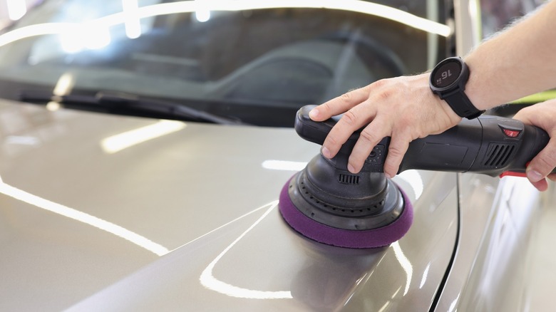 buffing out a scratch on a car