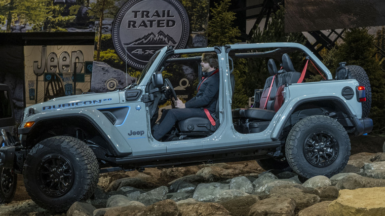 2023 Jeep Wrangler JL Unlimited Rubicon with doors removed at showcase event, left-side view