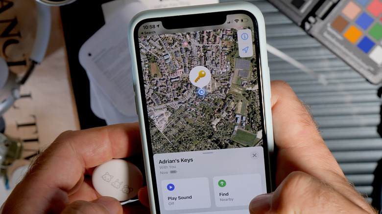 Find My app on an iPhone with an AirTag next to it