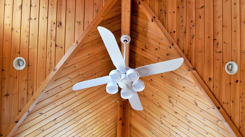 Fan on wooden ceiling