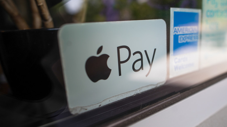 Apple Pay sticker in window