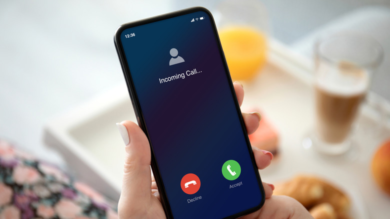 Phone showing incoming call screen