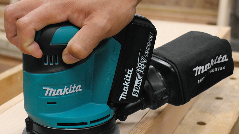 Makita 18V LXT Orbit Sander in use