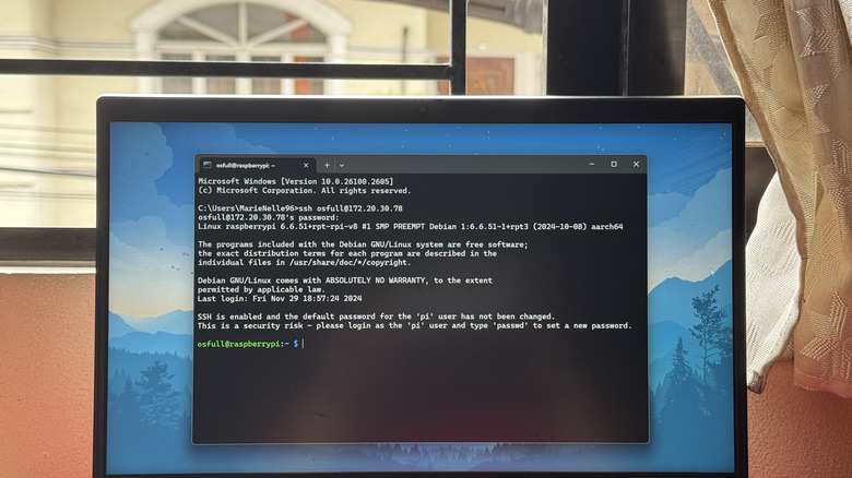 Raspberry Pi SSH session from a Command Prompt shown on laptop