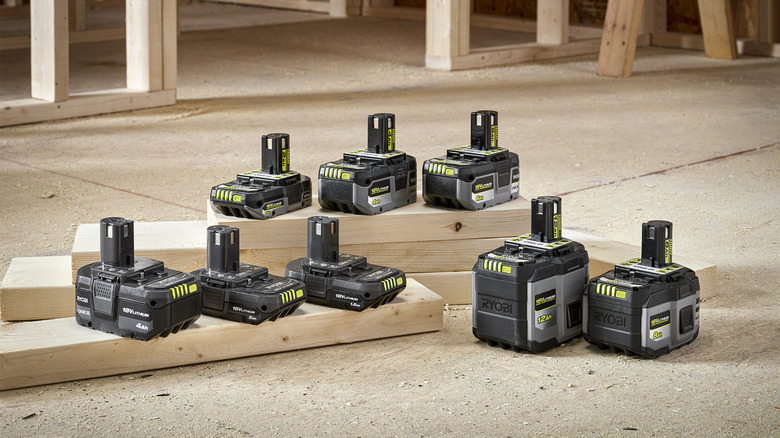 Ryobi ONE+ battery packs on ground