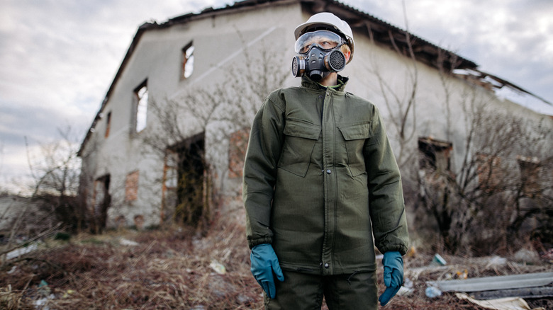 A person wearing a respirator outside