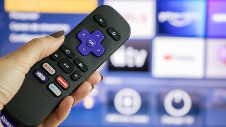 Standard Roku IR remote being held