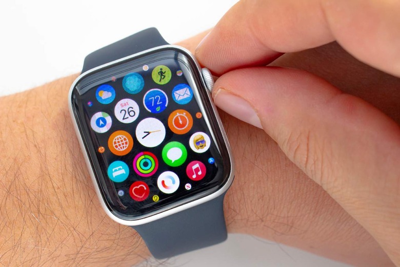 Person navigating through Apple Watch apps