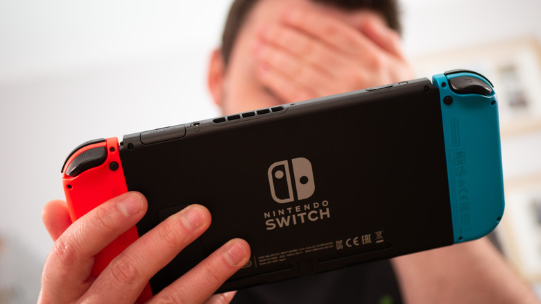 Man frustrated Nintendo Switch