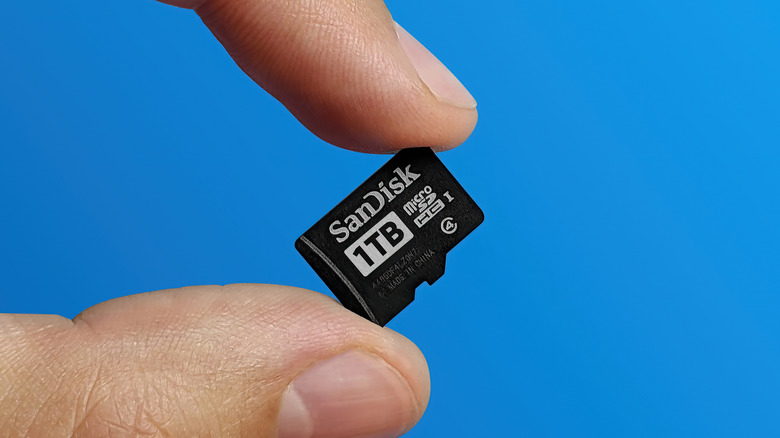 MicroSD card in fingers