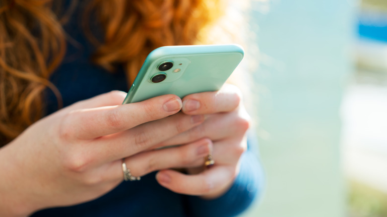 Woman typing on Android