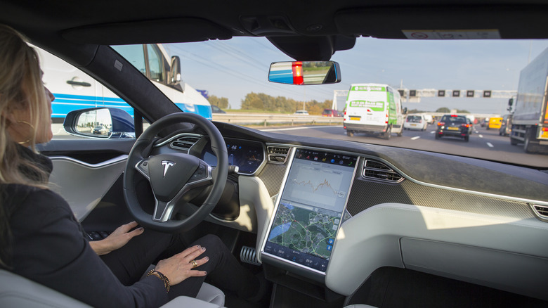 Tesla in Autopilot on highway