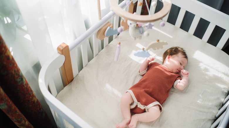 Baby sleeping in crib