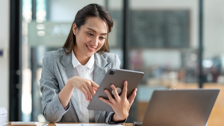 woman using iPad