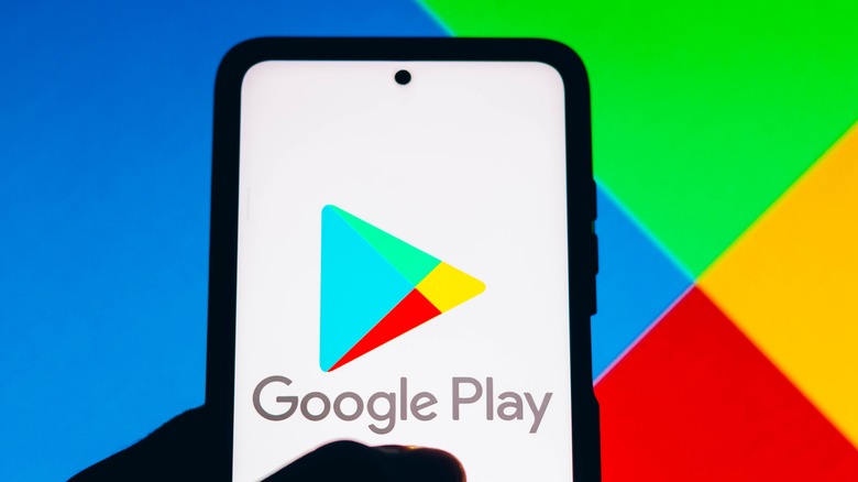 Google Play Store logo on smartphone