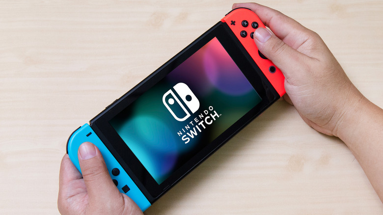 Nintendo Switch in hands