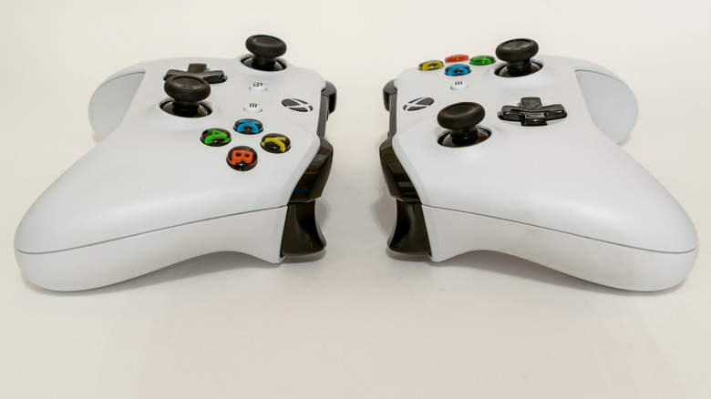 A pair of Xbox controllers