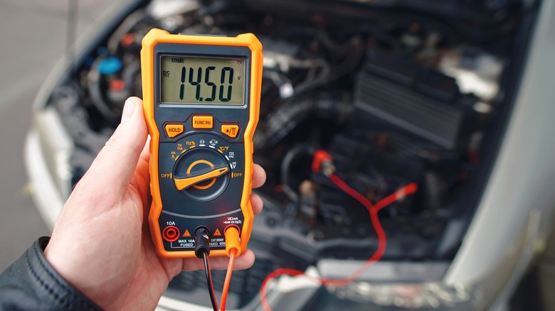 testing charging system of car with multimeter