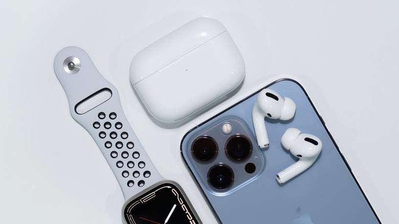 AirPods iPhone Apple Watch on table