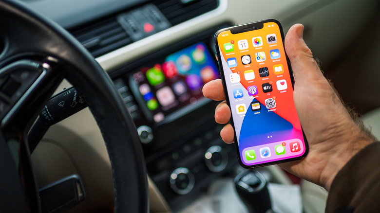 iPhone held in car