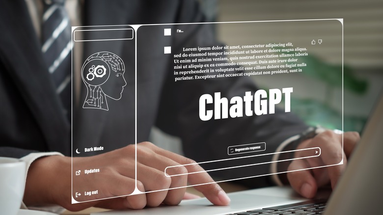 Person typing on laptop ChatGPT logo