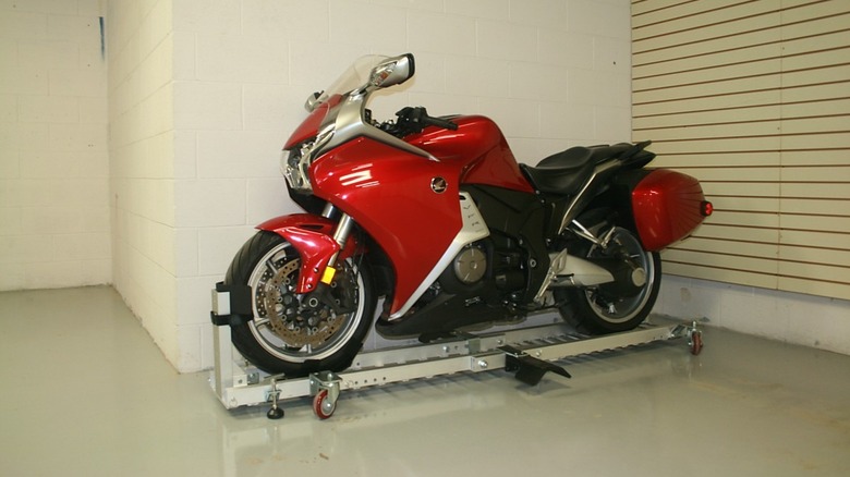 motorcycle on Condor dolly in garage