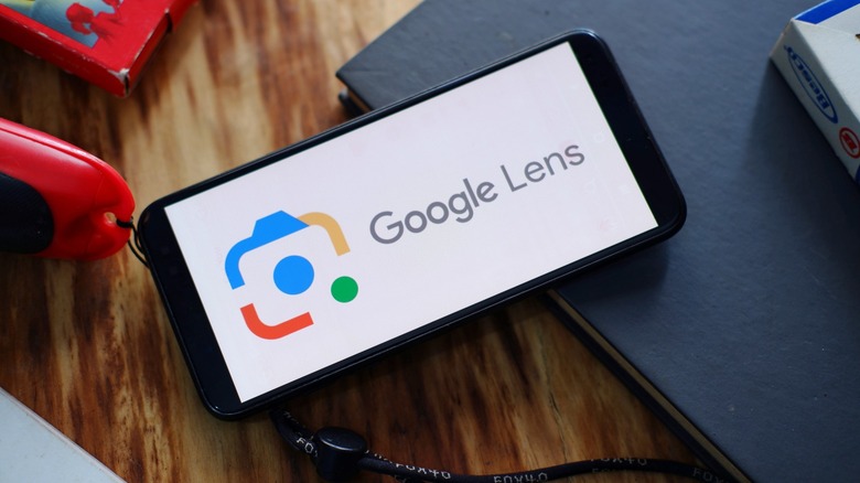 Google Lens logo on a phone