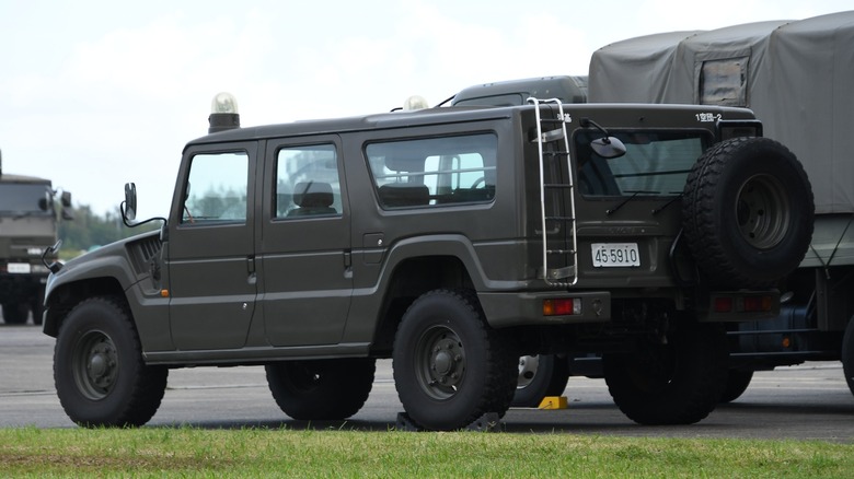 Toyota Mega Cruiser parked driver side