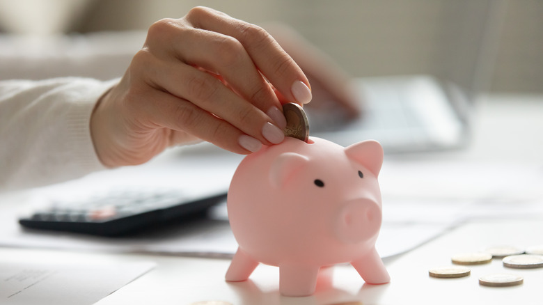 Piggy bank on wooden table