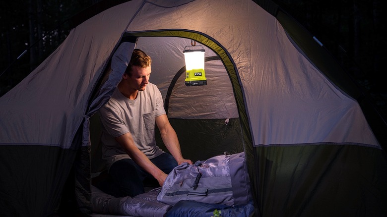 Ryobi lantern hanging in tent