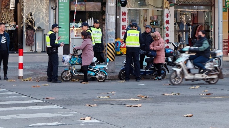 police stopping electric scooters