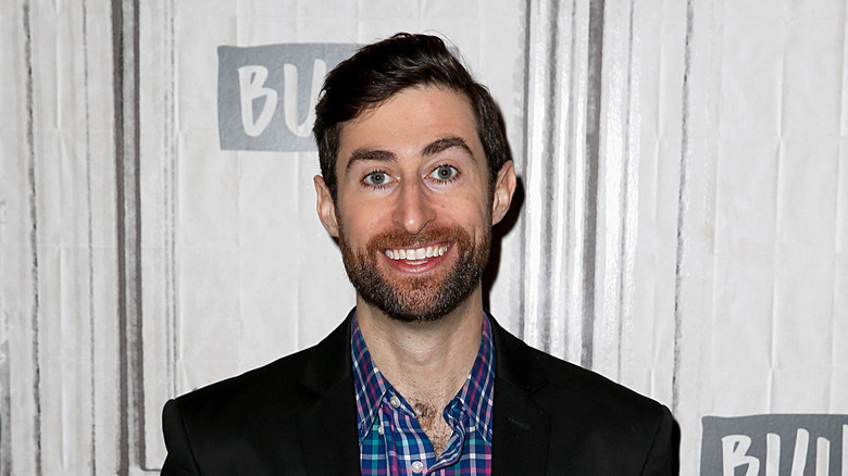 Scott Rogowsky smiling for a photograph