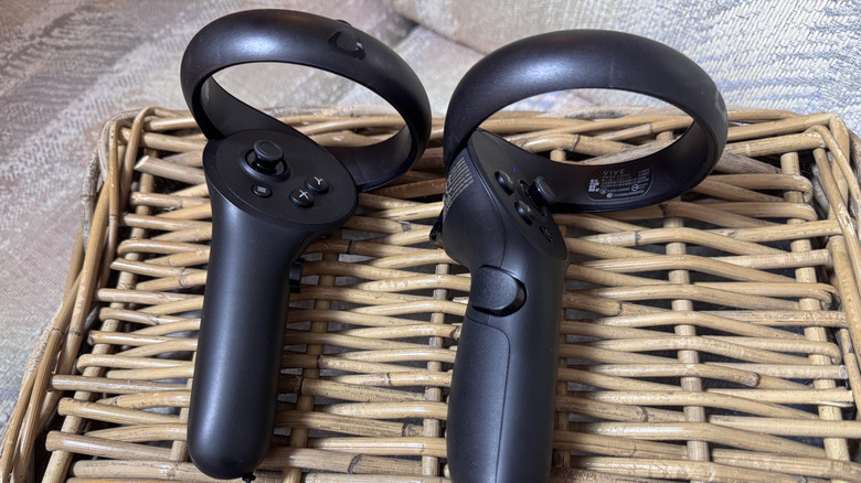 The HTC Vive Focus Vision  controller on a woven basket.