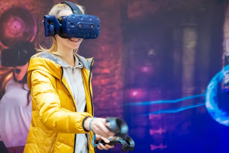 Woman playing in Vive headset