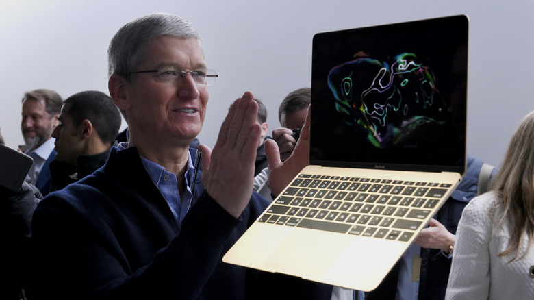 Apple CEO Tim Cook with the MacBook