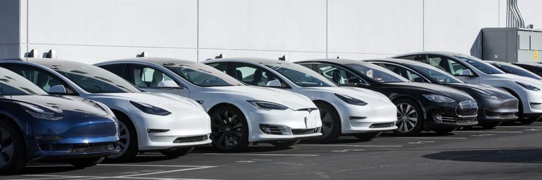 Several Tesla cars lined up 