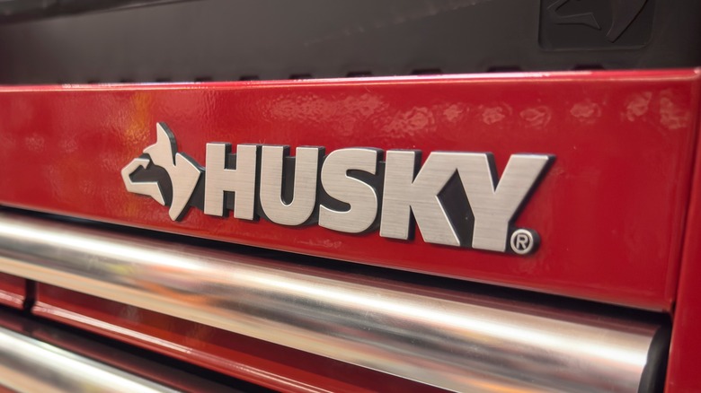 The Husky logo on a red tool box.