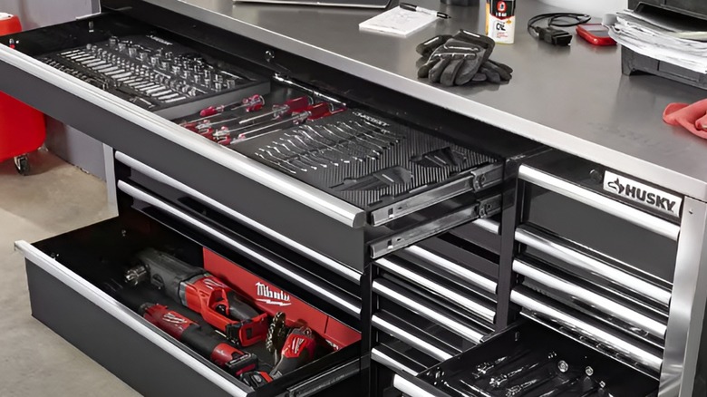 Husky tool chest with open drawers revealing tools