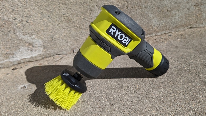  Ryobi USB Lithium Compact Scrubber Kit on cement