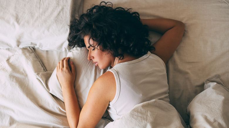 woman sleeping in bed