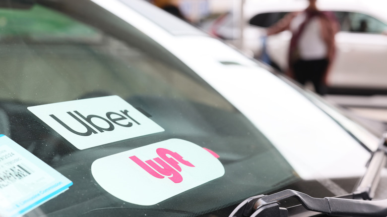 car with uber lyft sticker