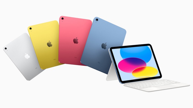 Different colored iPads on white background