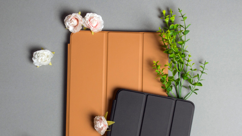 black and brown iPad cases on table