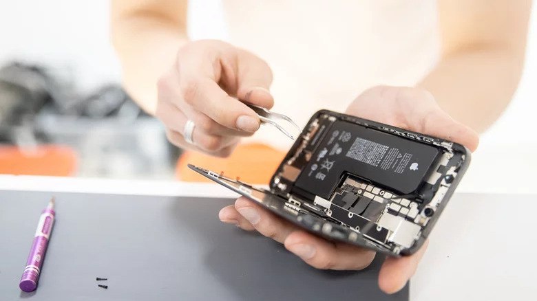 iPhone battery exposed for repair