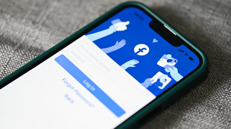 Facebook icon on blue phone screen